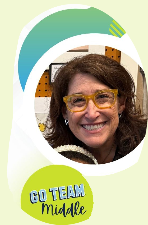 A woman with glasses smiles